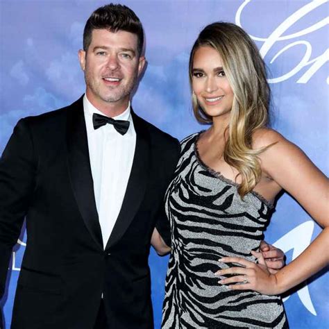 Robin Thicke Gets Fiancées Naked Body Tattooed on Arm